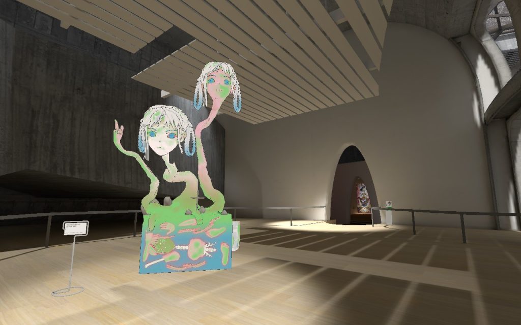 The interior of a brutalist bulding with a hand-drawn picture of two heads on tentacles in the middle of the floot.